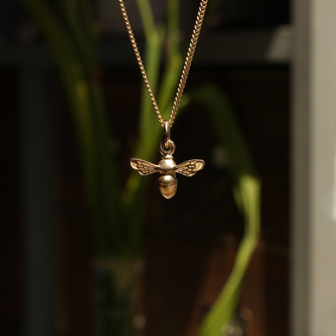 Tiny bee charm