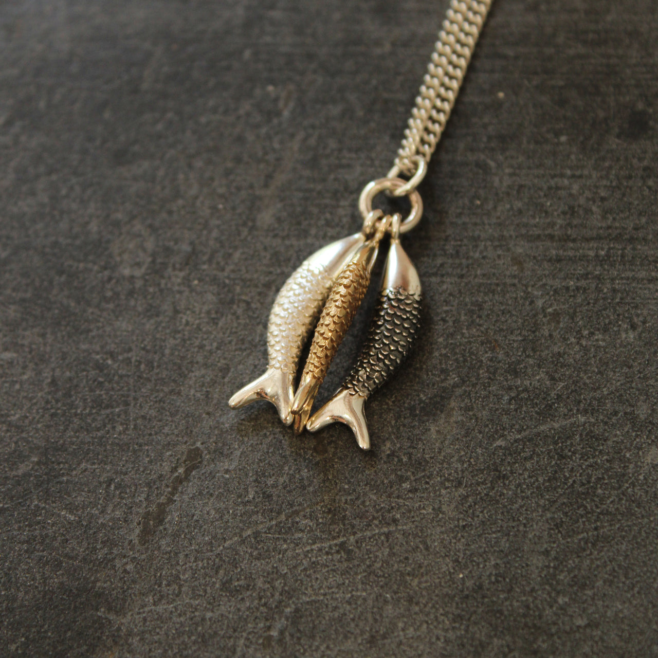 Three mermaids - gold, silver and oxidised silver