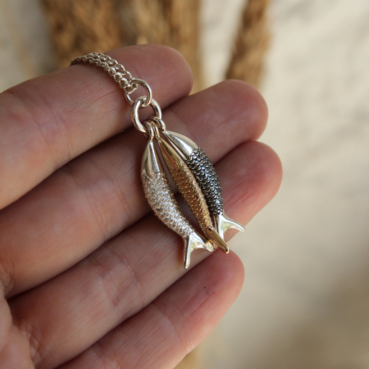Three mermaids - gold, silver and oxidised silver
