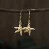 Tiny starfish hooks - solid 9ct gold