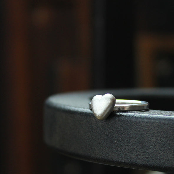 Pebble heart on a silver ring