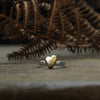 Solid 9ct gold heart on a silver ring