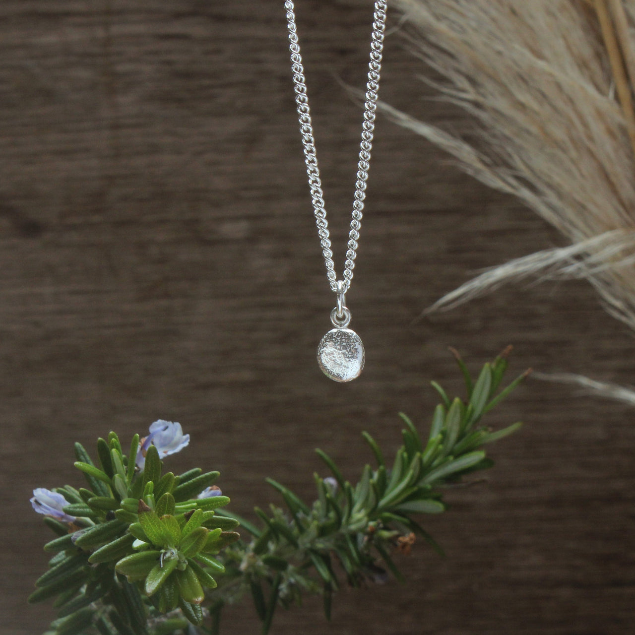 Tiny St Martin's pebble charm